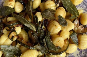 Gnocchi with fried zucchini. Topped with sage that got crispy in browned butter.