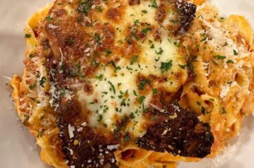 Chicken Parm and Fresh Fettuccine with Vodka Sauce.