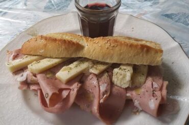 Mortadella with sharp provolone with my own homemade red wine mangia!!!