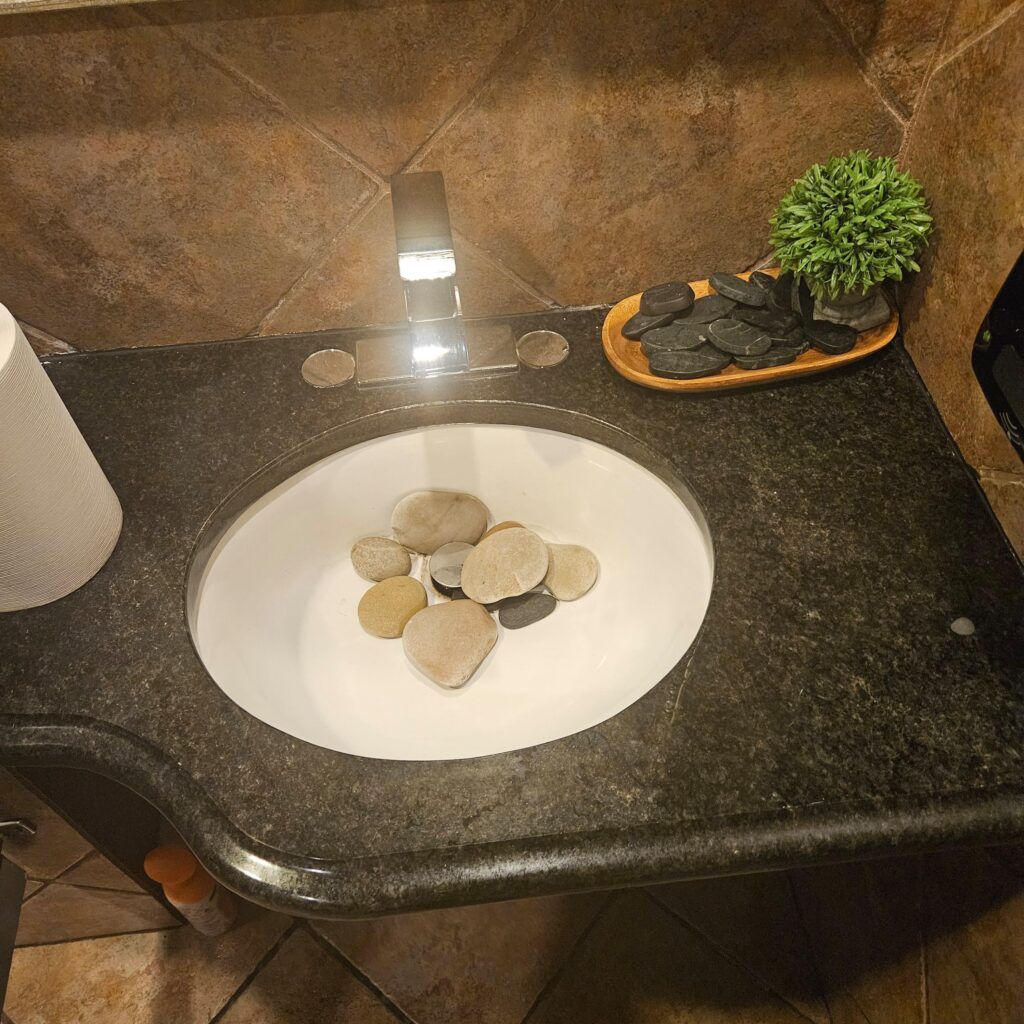 What's the point of all these rocks in the restroom of a local upscale Italian restaurant?