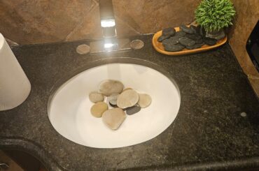 What's the point of all these rocks in the restroom of a local upscale Italian restaurant?