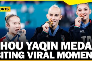Zhou Yaqin Chinese gymnast adorable metal-biting moment goes viral at Paris Olympics 2024
