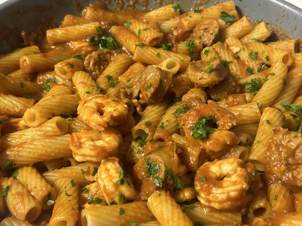 Rigatoni with shrimp, Italian sausage, spicy tomato sauce.
