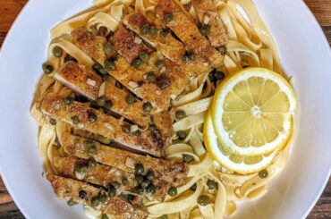 Homemade fettuccine with chicken piccata.