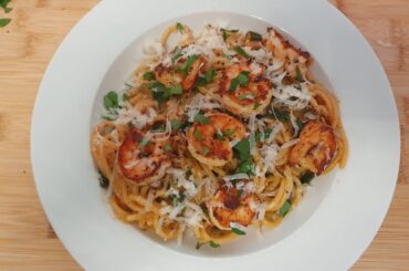 Pan fried lemon-garlic Shrimp with brandy reduction and homemade lobster stock on DeCecco Spaghetti n12