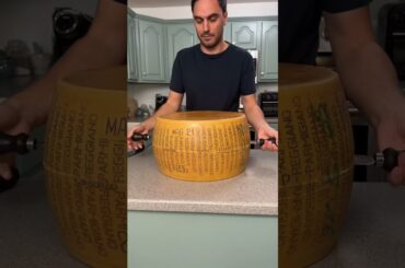 Opening a 90lb cheese wheel - Parmigiano Reggiano