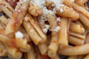 Just an ordinary casarecce pasta, with fresh tomato sauce, some olives and parmesan