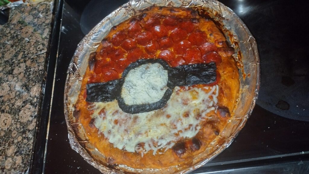 My second ever pizza made it's a POKEBALL