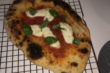 First attempt at a sourdough Neapolitan(ish) pizza in my electric oven (w/ broiler), how’d I do?