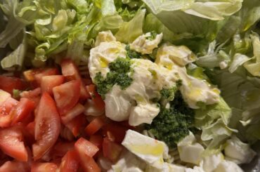 Tomato, Iceberg Lettuce, Mozzarella Salad. With olive oil, homemade mayonnaise, garlic and parsley.