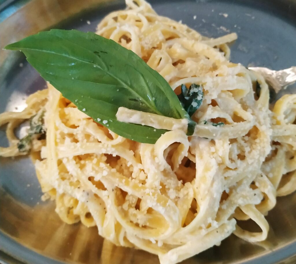 fettucine alfredo pasta with fresh parmesan, made by my 9-year-old brother