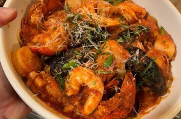 Cioppino over angel hair. Lobstah, clams, mussels, scallops and cod.