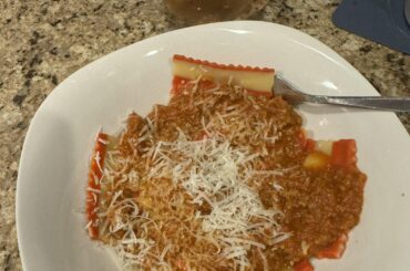 Lobster ravioli, Bolognese sauce with freshly grated Parmigiana cheese. 
And of course there is wine! 🍷
