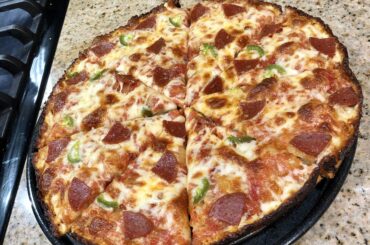 First shot at cast iron pan pizza. Edges were edible despite looking beyond crispy.