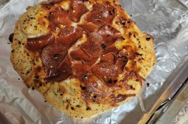 What do you guys put on the tomato sauce? Like, is there anything more or is it just tomato sauce? And if so, what brand/type is the sauce? (I have to add an attachment apparentely, so I will just put the first pizza I made long ago)