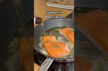 Mouth-watering Salmon in Beer Sauce infused with thyme and tomatoes. #salmonrecipe #cooking #salmon