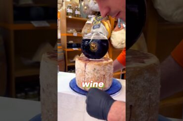 Why Is This Guy Pouring Wine Into Cheese? #italy #food