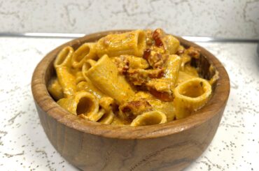 Sun dried tomato pesto cream sauce with mezzi rigatoni