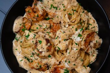 Blackened shrimp with a garlic, Parmesan and blue cheese Alfredo with lump crab meat.