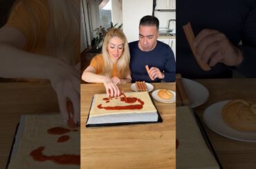 He hides hotdogs into the Pizza#food