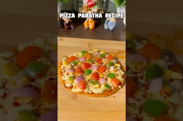 Viral paratha pizza recipe #shorts #recipe #pizza #paratha #cheese #trending #shortsfeed #viralvideo
