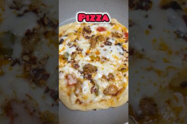Pizza at home#youtubeshorts #shortsvideo #shortsfeed #shorts #shortsvideo #foodie #recipe #trending