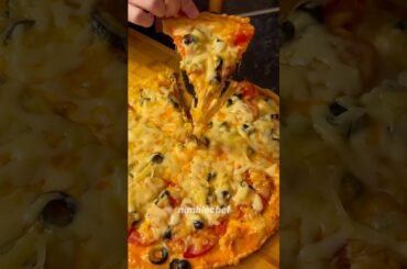 Insanely cheesy homemade pizza in 40 seconds! Perfect for your next dinner night!