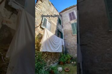 Laundry in Italy. There’s always a view & maybe some wine and a local cat #italianlife #italiandream