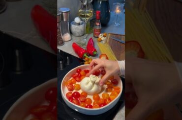 Pasta with Creamy Sauce and Tomatoes with Burrata