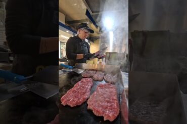 Italian Soft Sausages "Salamelle" on the Grill. Italy Street Food