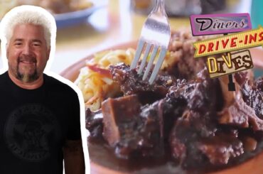 Guy Fieri Eats Oxtail Stew | Diners, Drive-Ins and Dives | Food Network