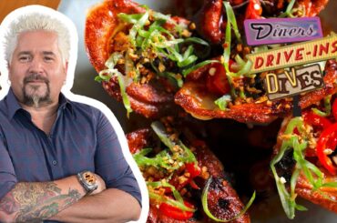 Guy Fieri Eats Pork Dumplings | Diners, Drive-Ins and Dives | Food Network