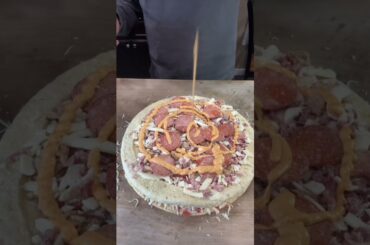 Pizza HACK              It feeds four for the size of one pie in the oven.