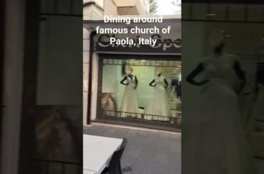 Dining around famous church of Paola, Italy