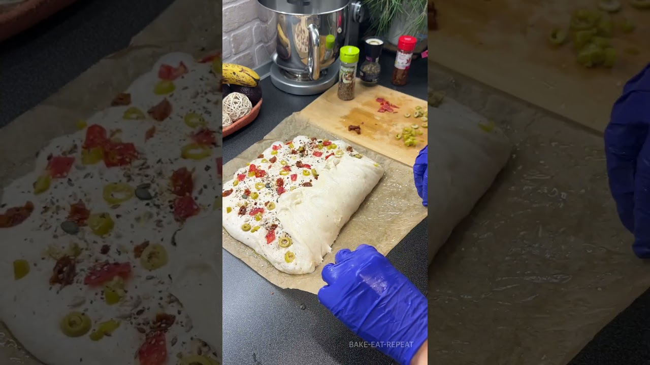 Fluffiest and Spicy Focaccia with Hot Peppers, Olives and sun-dried Tomatoes Fluffiest and Spicy Focaccia with Hot Peppers, Olives and sun-dried Tomatoes