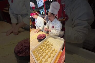 Filling Chinese Dumplings. Italy Street Food Festival