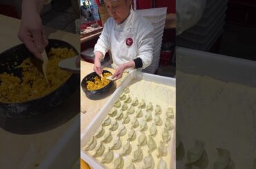 Preparing Chinese Dumplings. Italy Food Festival in Milano