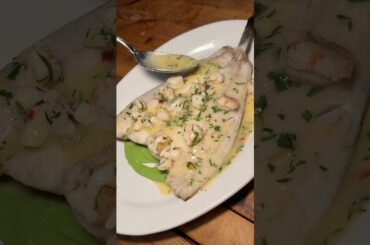 The BRANZINO ALLA PIASTRA topped with ROCK SHRIMP SCAMPI from Da Toscano NYC! 🔥🤤 #DEVOURPOWER