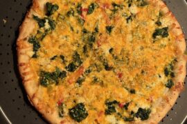 spinach and onion/pepper pizza with three cheese (homemade dough)