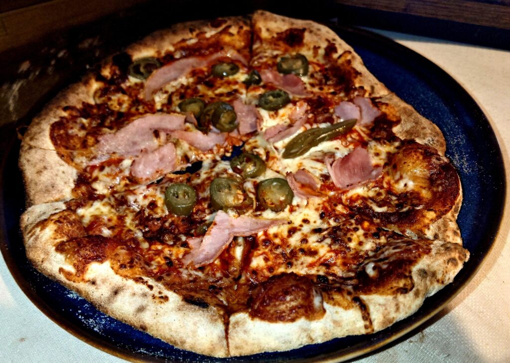 Came home at 1am, fired up the Gozney and scraped the fridge for toppings.