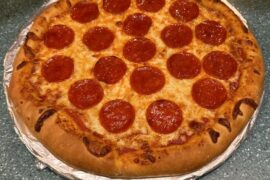 What are different ways to prevent soggy/floppy home made pizza?