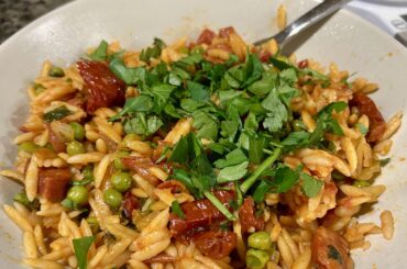 Chorizo, sun dried tomato and pea orzo