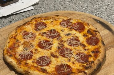 Ooni classic crust, homemade sauce and cheese blend.