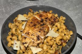 Tuscan chicken pasta with crispy chicken breast on top
