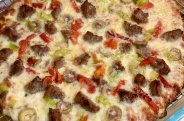 Newbie here but man this tastes amazing (My first recipe by Kenji Thin Crust pizza)