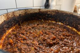 Is this dark buildup avoidable when baking sauce uncovered?