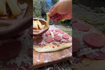 Cooking Italian Stromboli roll pizza #outdoorcooking #viralshort #cookinginnature