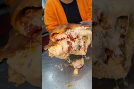 This CHEESY PEPPERONI CALZONE needs to be on your NYC DEVOUR-list! 🍕 Nuovo York Pizza! #DEVOURPOWER