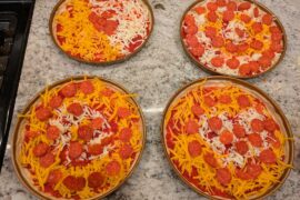 The kiddos topped the bar pizzas tonight, no leftovers were found