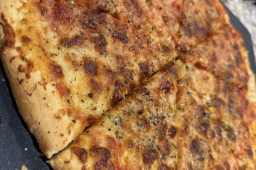 4 cheese in the oven on an aluminum pan